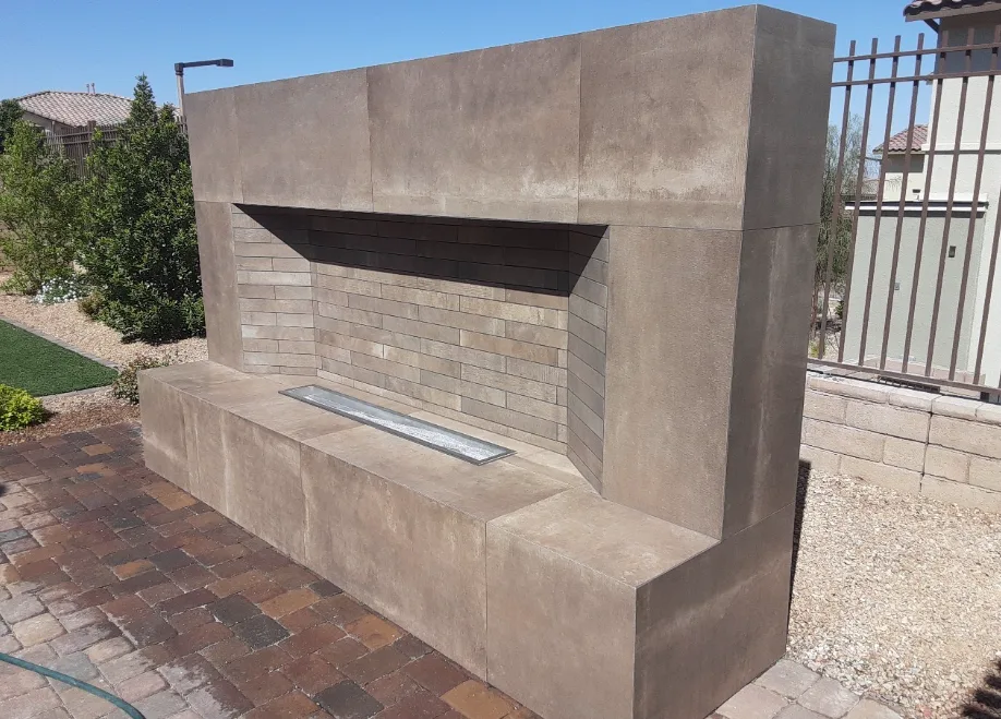 Outdoor fireplace wall with linear burner